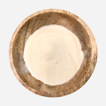 wooden bowl with xanthan gum powder inside