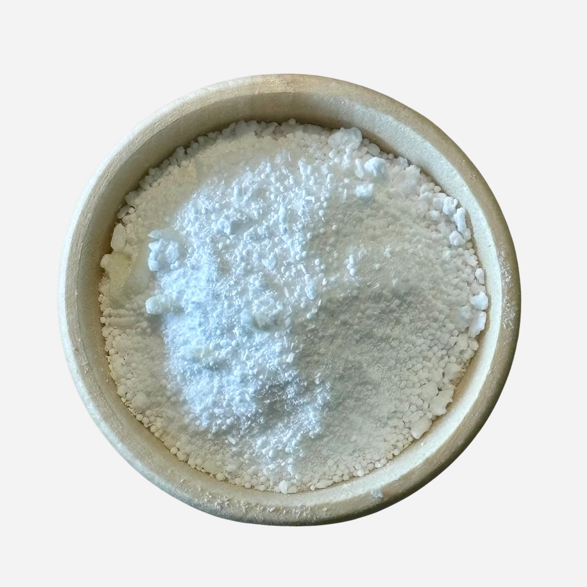 handmade laundry powder in wooden bowl. various white granular crystal like powderds/salts.