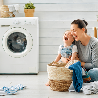 A Laundry with a Mum and child folding clothes