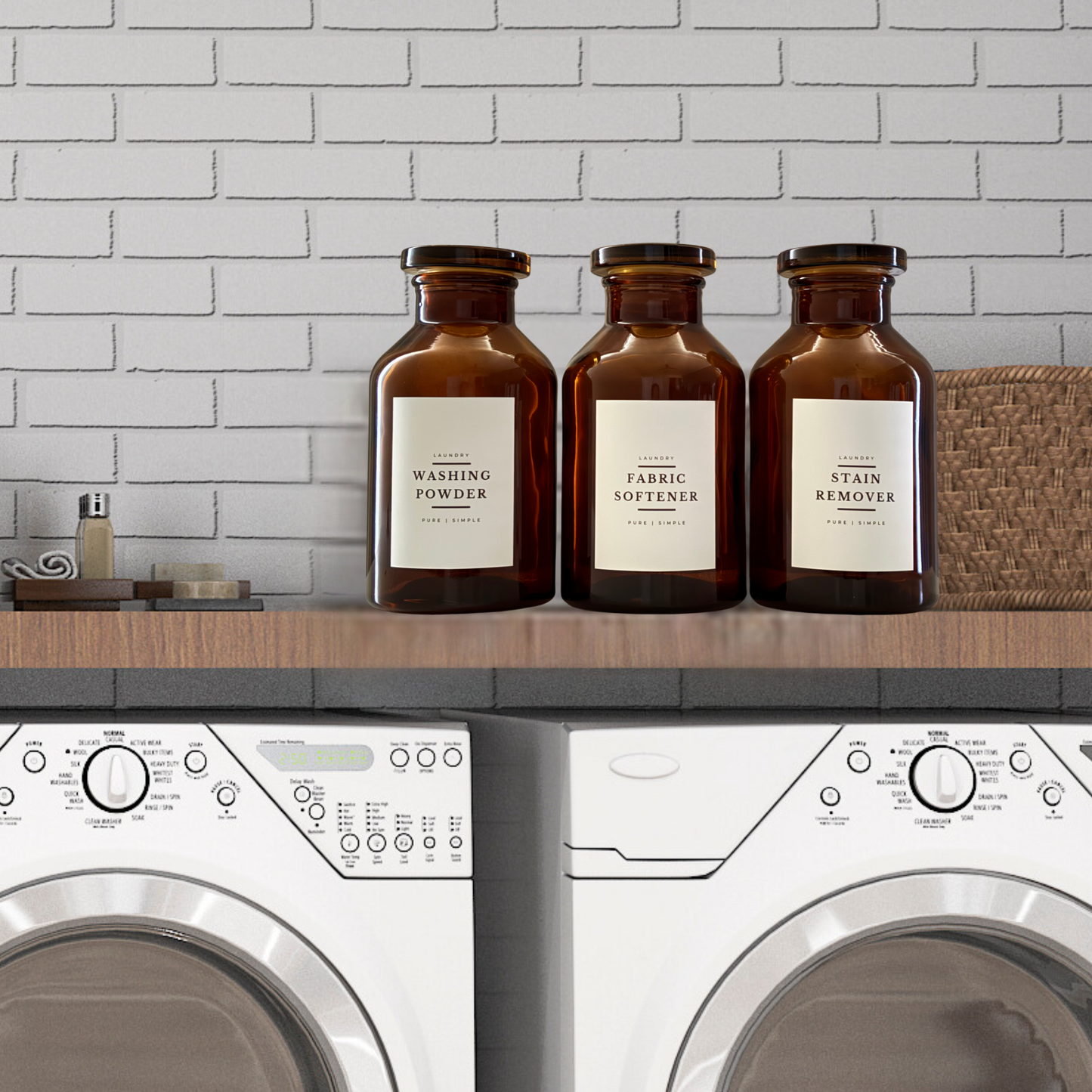 Washing Powder, fabric Softener and Stain remover vintage look amber glass apothecary jars set in modern laundry. 